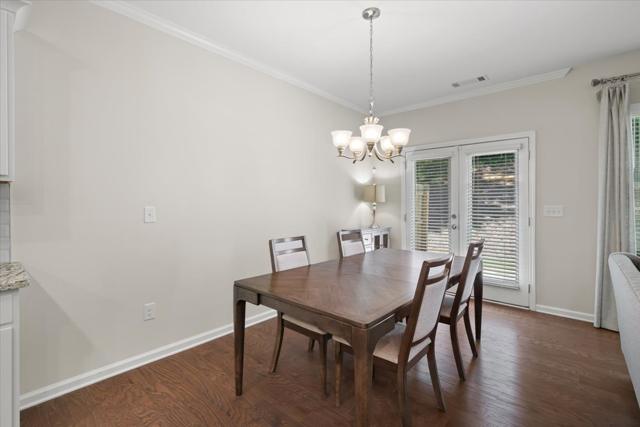 Dining area with doors to the patio